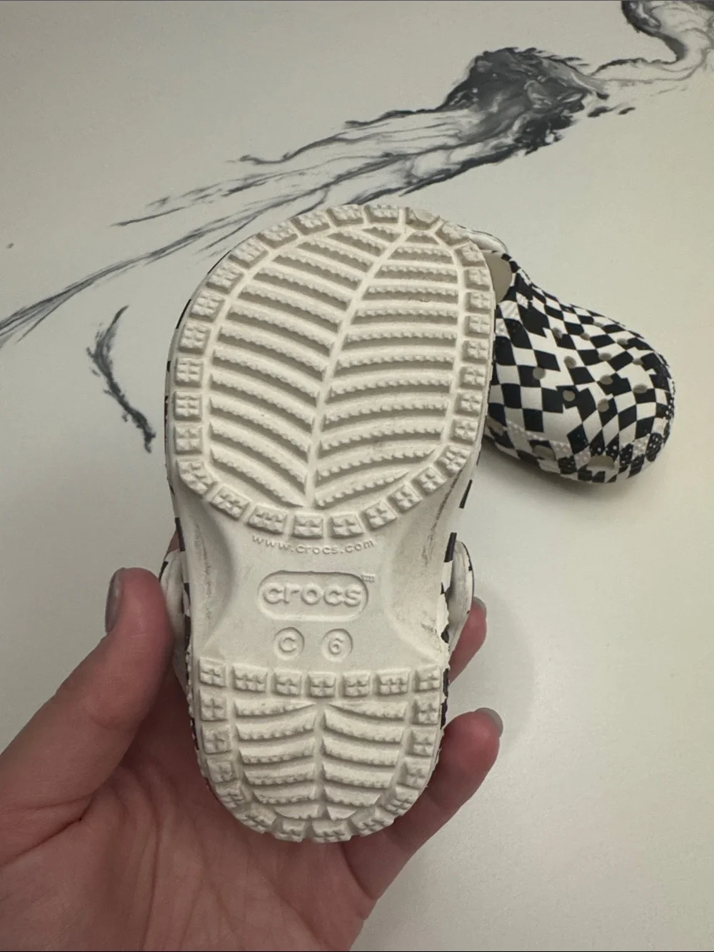 CROCS Kids Checkerboard Slip-On Clogs in Black and White